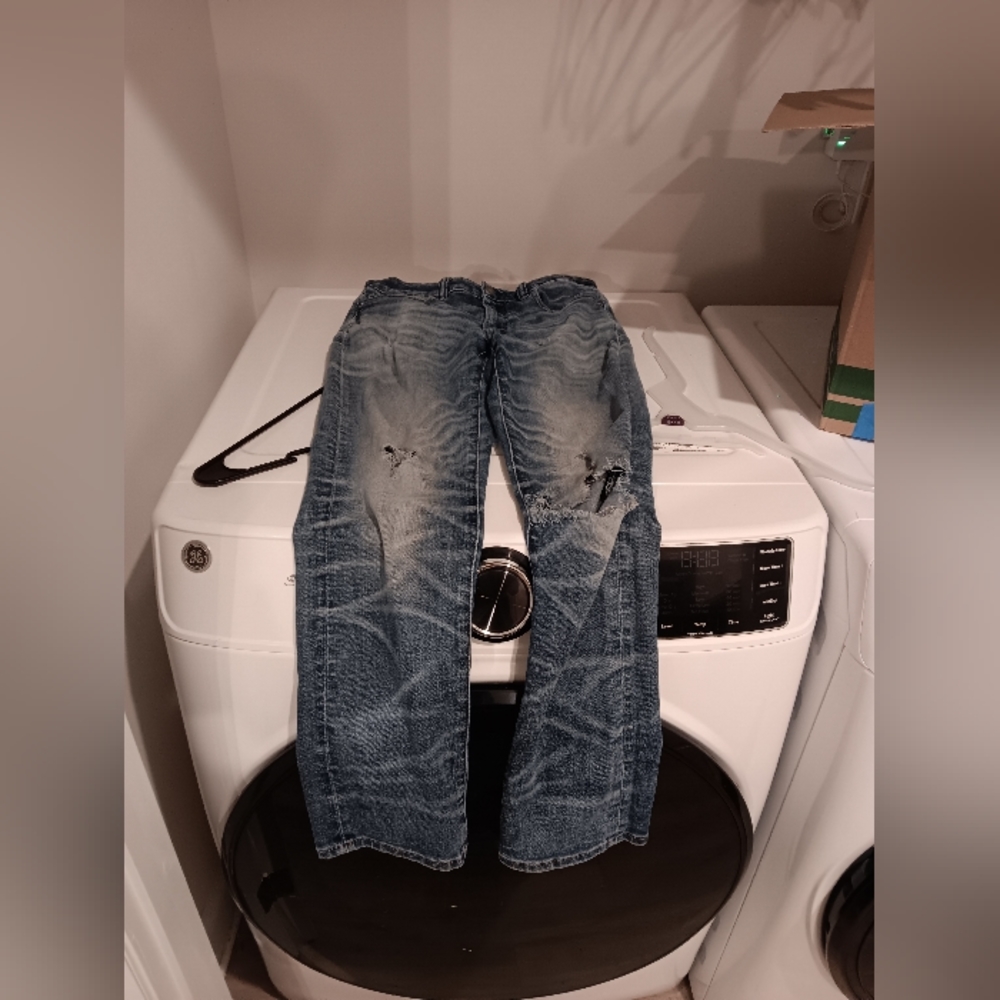 Blue ripped American Eagle jeans 30x32